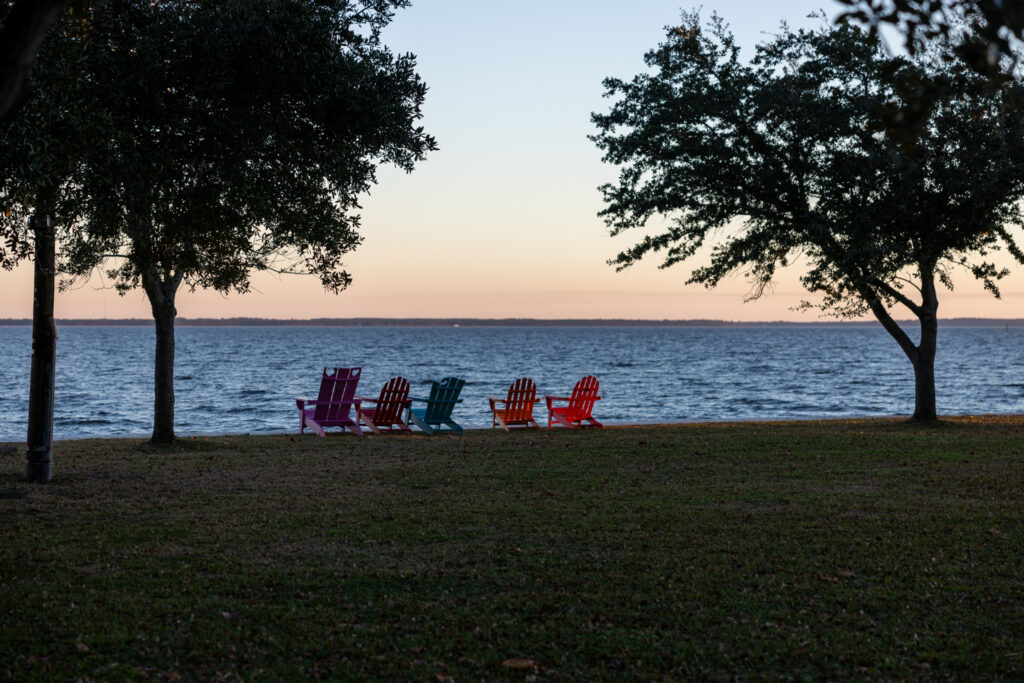 waterfront view of aiderondack chairs