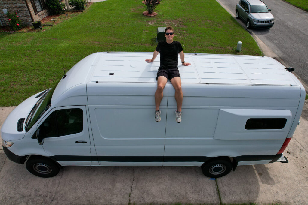 elliot sitting on empty roof without roof rack