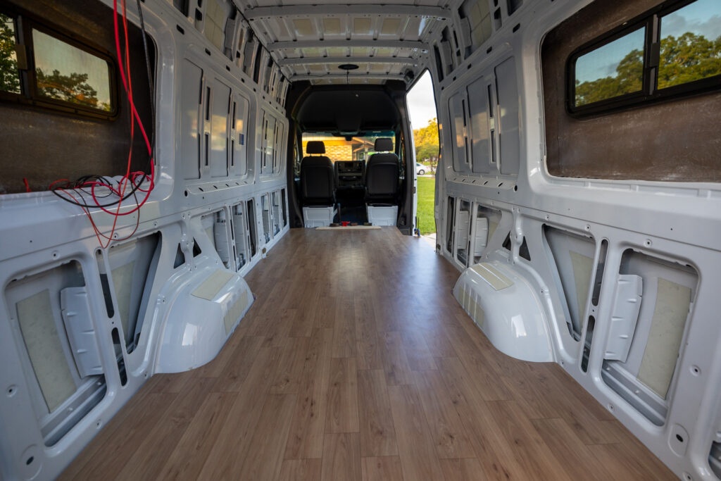 view of finished wood vinyl in camper van floor