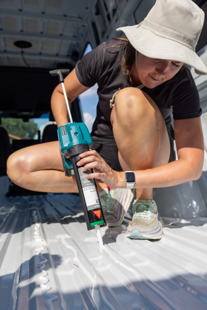 Jennifer using makit caulk gun