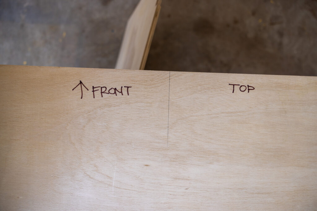 labeled plywood front and top for inserting into van for floor