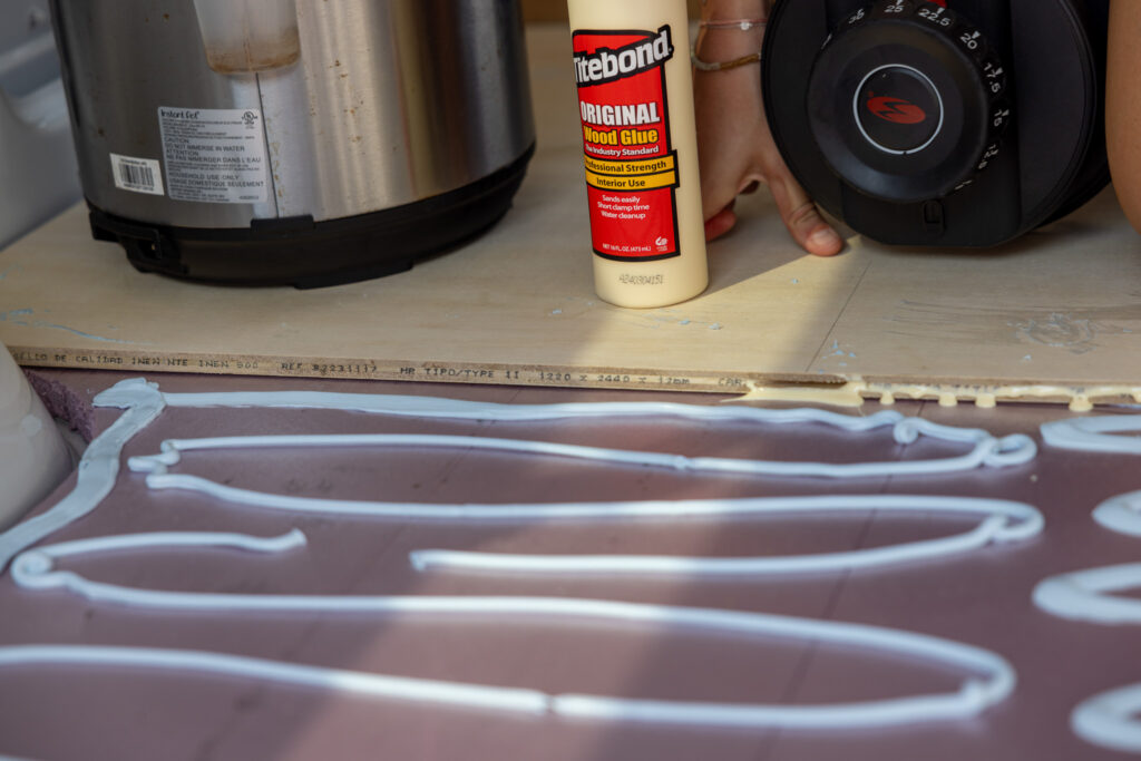 Jennifer applying the wood glue