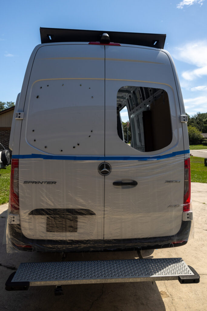 holes drilled as first step in cutting out window