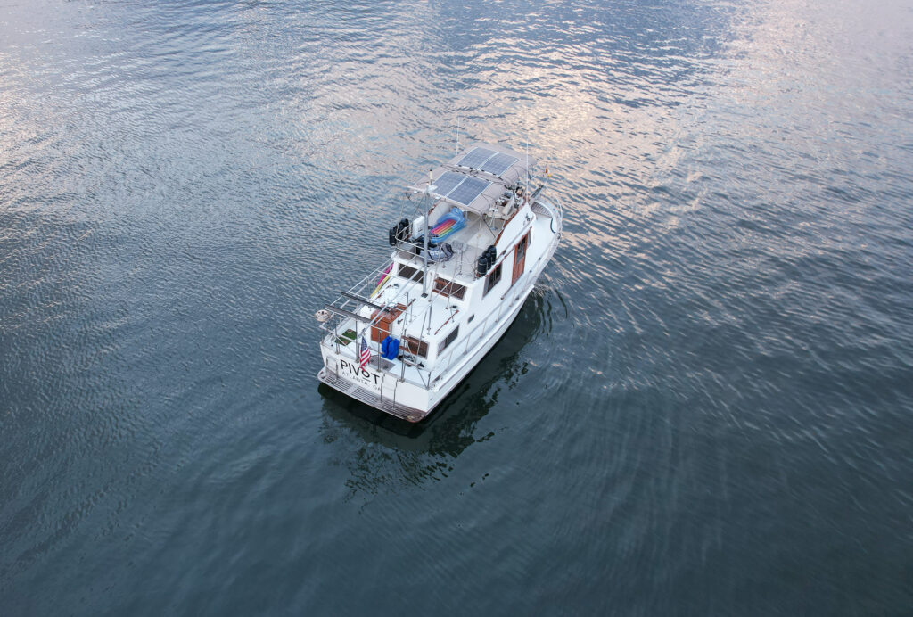 our boat drone shot showing four solar panels